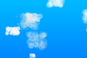 Some clouds drifting across the screen, drawn via the HTML5 Canvas.